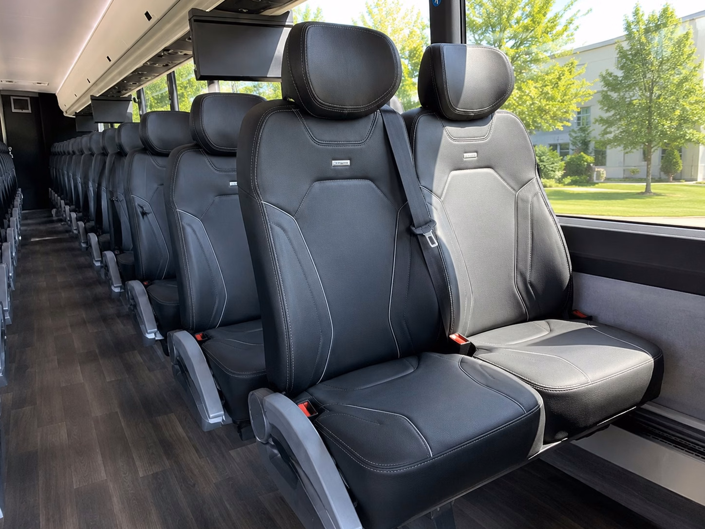 shuttle buses for ceremony to reception transfers across des moines